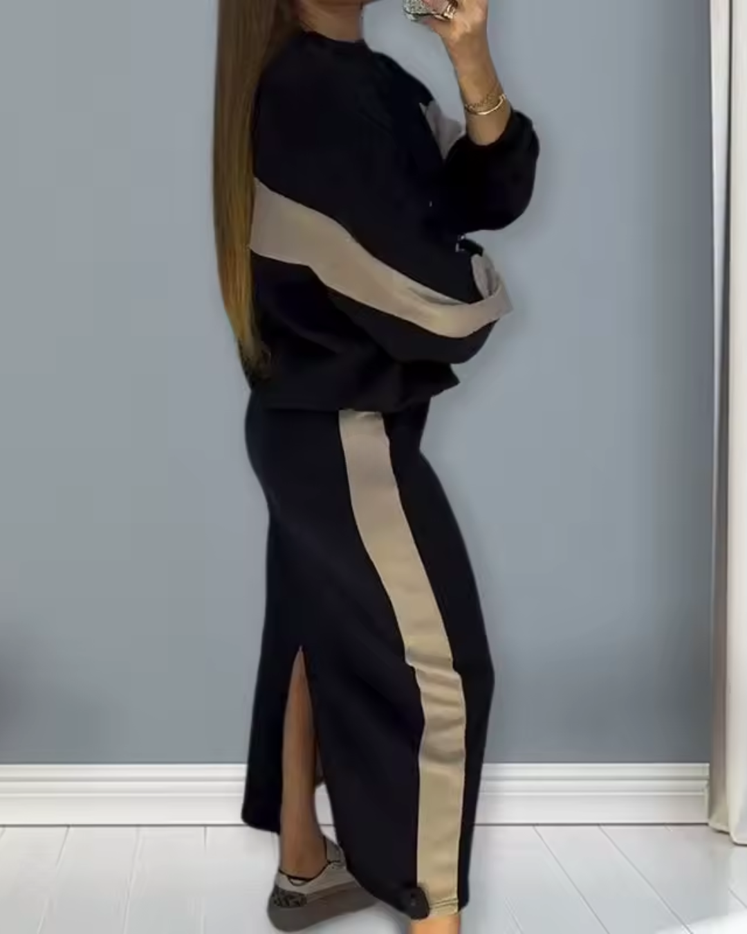 Conjunto folgado com top de manga comprida e saia com abertura para mulher