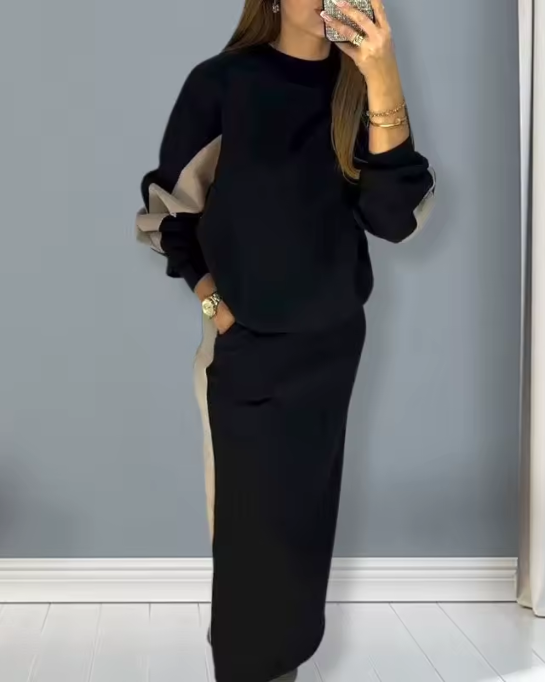 Conjunto folgado com top de manga comprida e saia com abertura para mulher