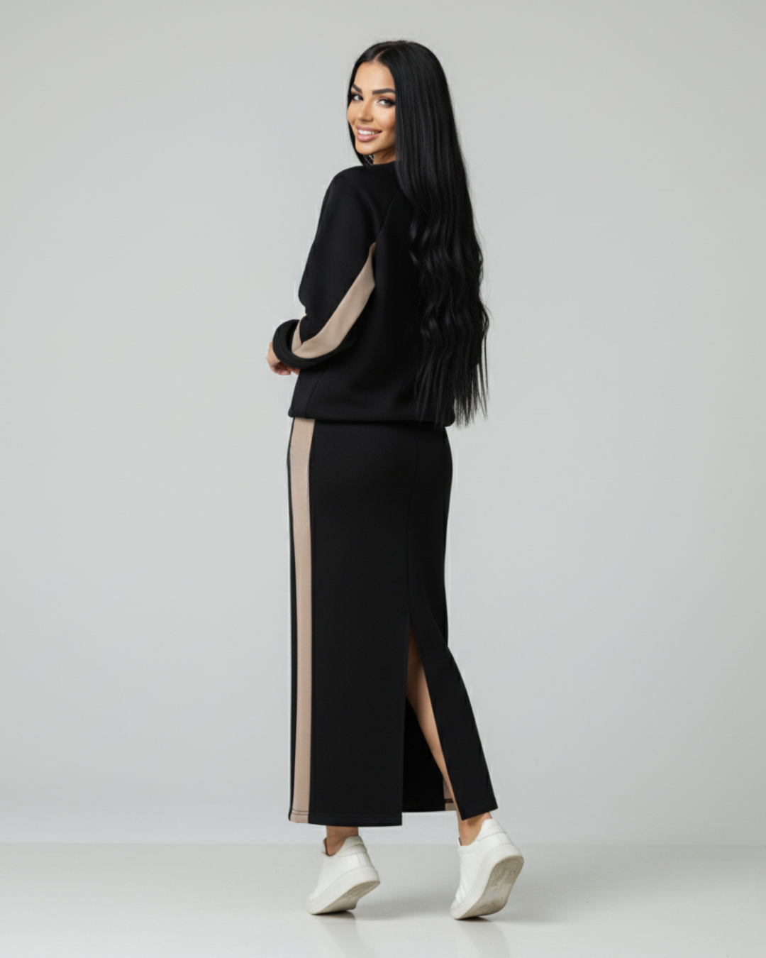 Conjunto folgado com top de manga comprida e saia com abertura para mulher